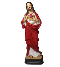 Standing sculpture of Jesus Sacred Heart